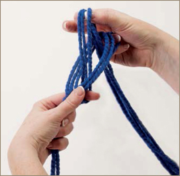 3 Complete the slip knot Reach through the loop grab the top set of strands - photo 6