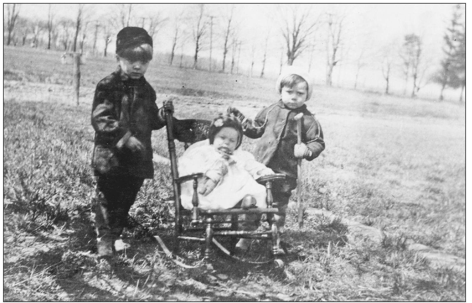 From left to right Cliff Alice and Roy Brainard pose in their front yard at - photo 7