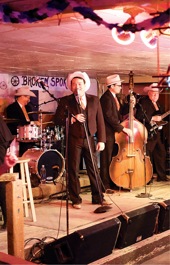 A country band in full toe-tapping swing at the Broken Spoke one of Austins - photo 9