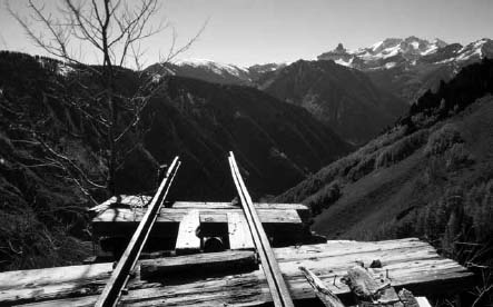 Broken tracks lead off into the void at the Suffolk Mine above Ophir Colorado - photo 2