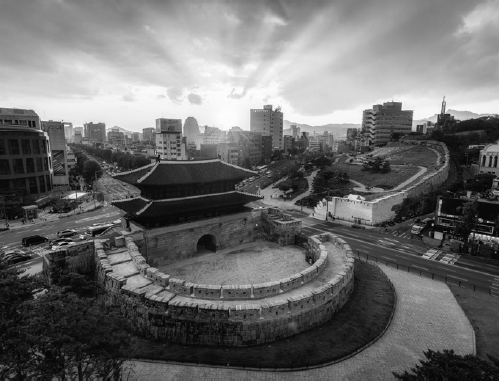 Behind the Pyeonghwa buildings on either side of Heunginmun-ro a group of - photo 5