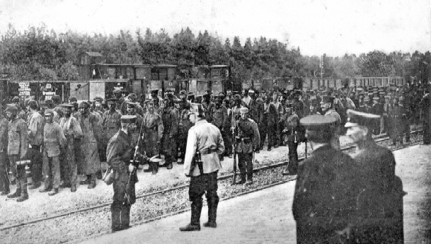 A remarkable picture of British prisoners arriving in Germany filthy and - photo 12