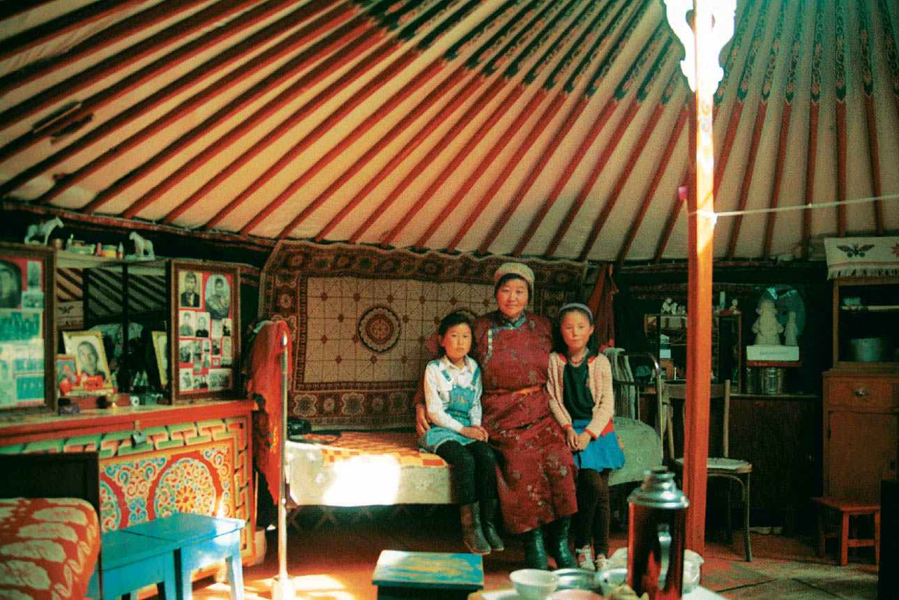 Inside a well-to-do ger in Arkhangai Province In front of one of - photo 12