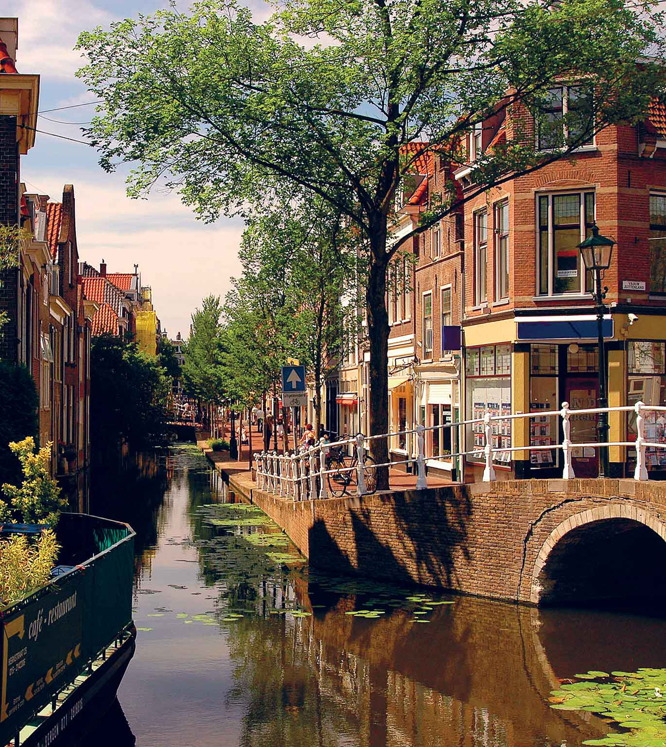 Canal Delft COPYRIGHTS BY SIGFRID LPEZGETTY IMAGES Cycling Between - photo 8