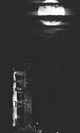 Near and yet so far A full moon rises over Cape Kennedy during Apollo 11 - photo 2