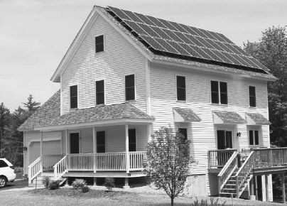 Townsend Massachusetts home with solar panels facing south Photo Credit - photo 5