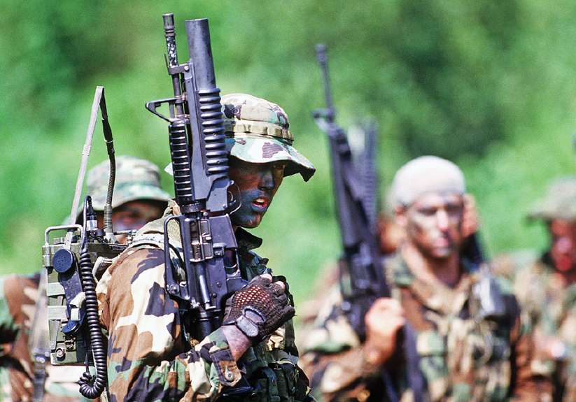 A vintage shot of US Navy SEALs from the 1990s Note the use of the Woodland - photo 6