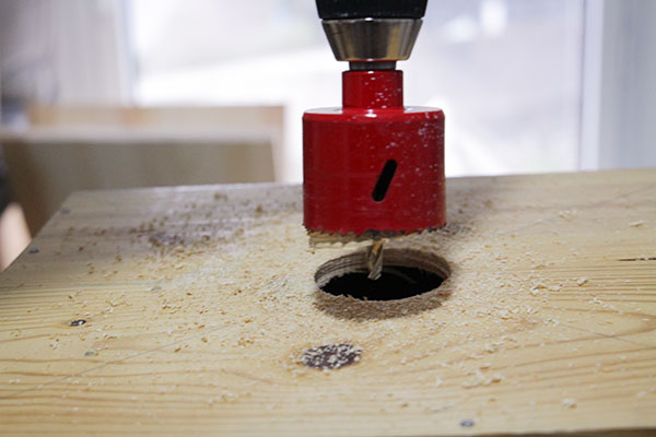 Using the hole saw cut a hole in the center of the crate where the diagonal - photo 5