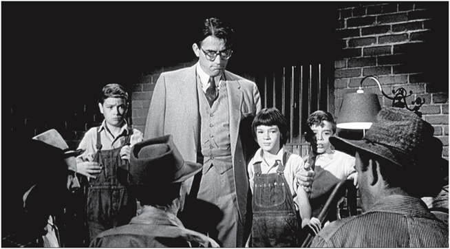 FIGURE 1 In To Kill a Mockingbird Atticus Finch and the children shielding - photo 3