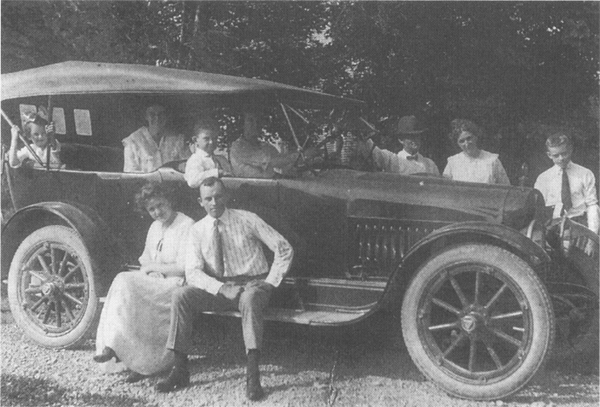 Edna Wildman Peterson on the running board of the family Hudson with her - photo 2