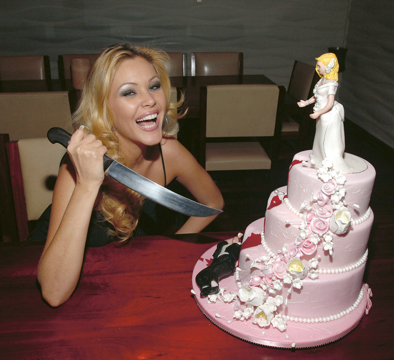 B A woman cuts into the cake at her divorce party Today many couples divorce - photo 8