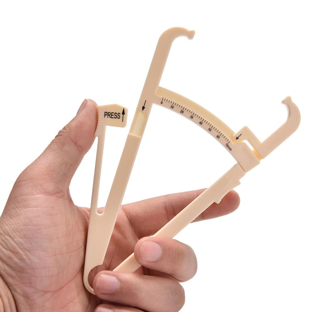 An image of a standard body fat caliper So once you get a caliper you should - photo 1