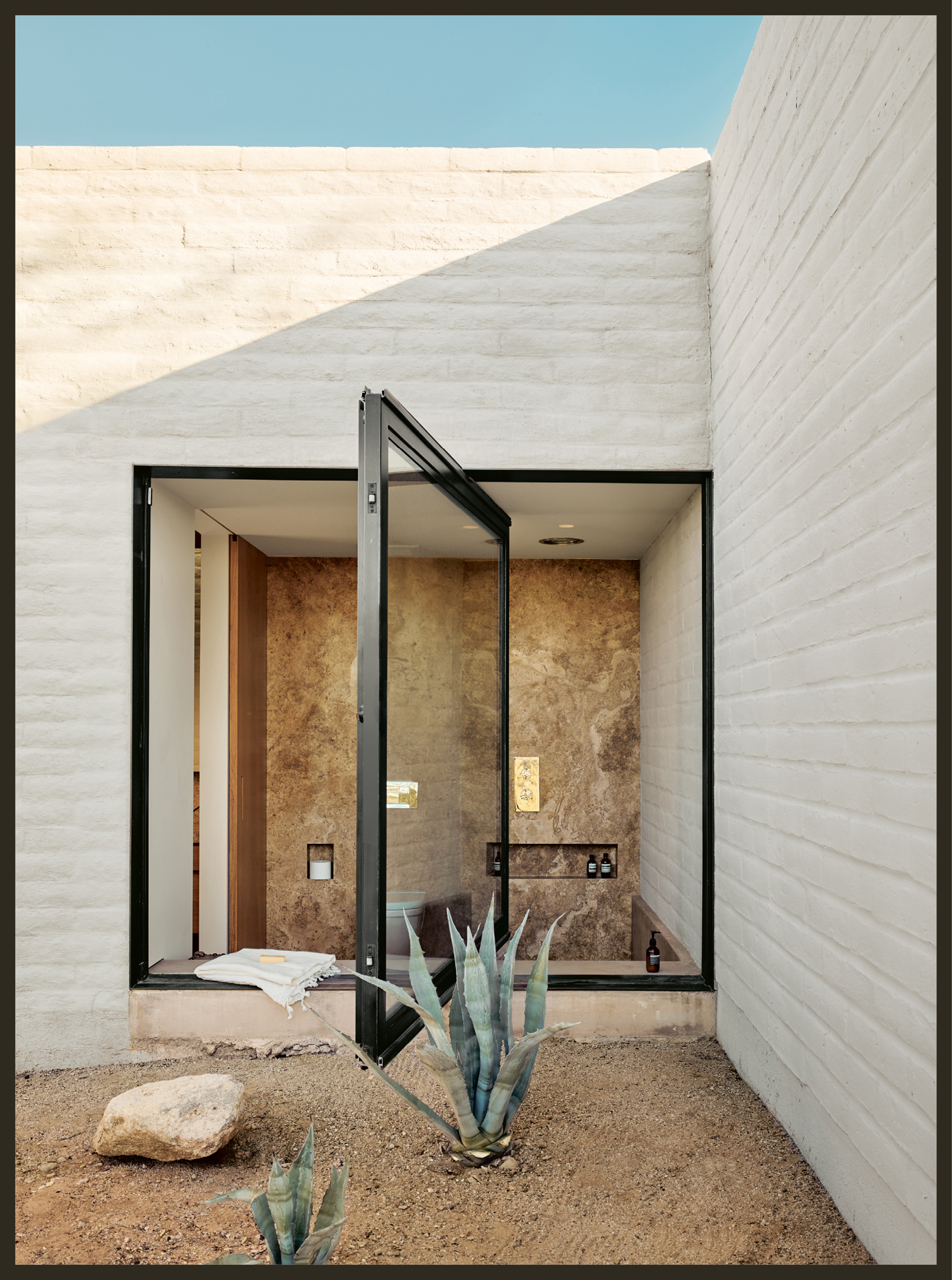 This is the master bathroom window it swings open to the desert outside - photo 4