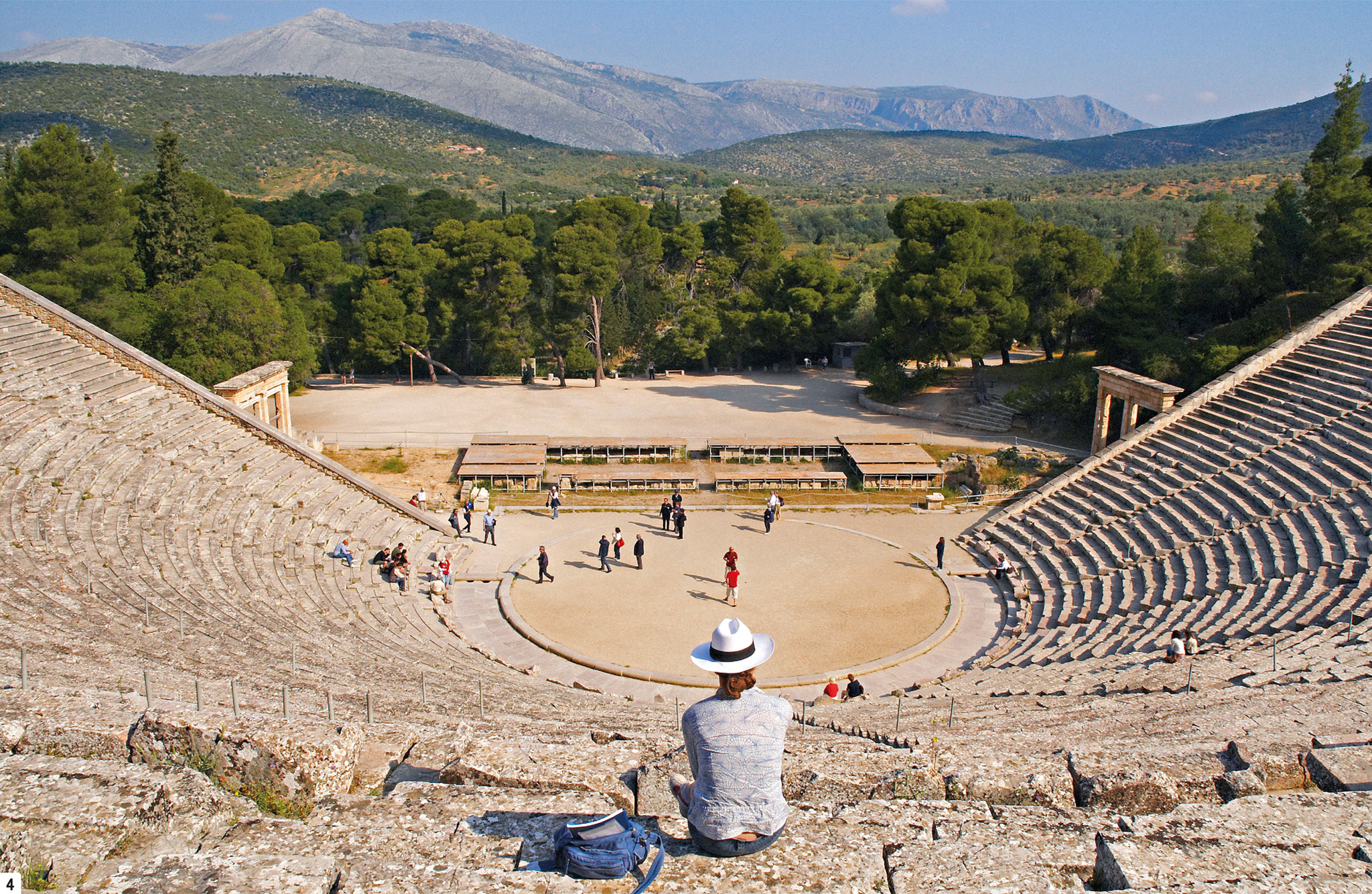 t The ancient theatre at Epidaurus still in use today Taverna-lined city - photo 6