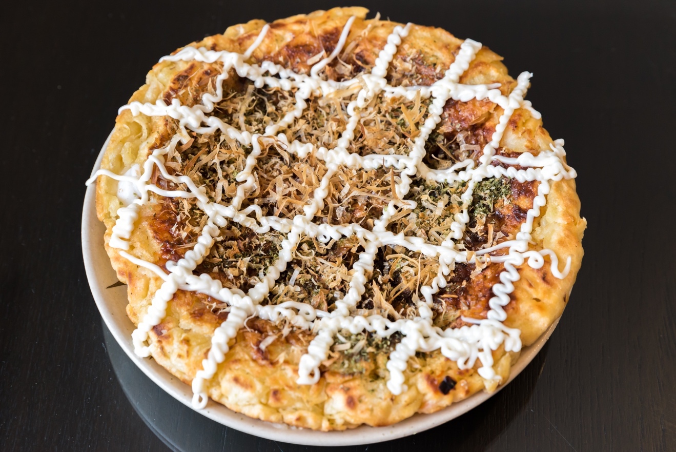 Okonomiyaki is indeed a type of Japanese pancake thats savory instead of sweet - photo 9