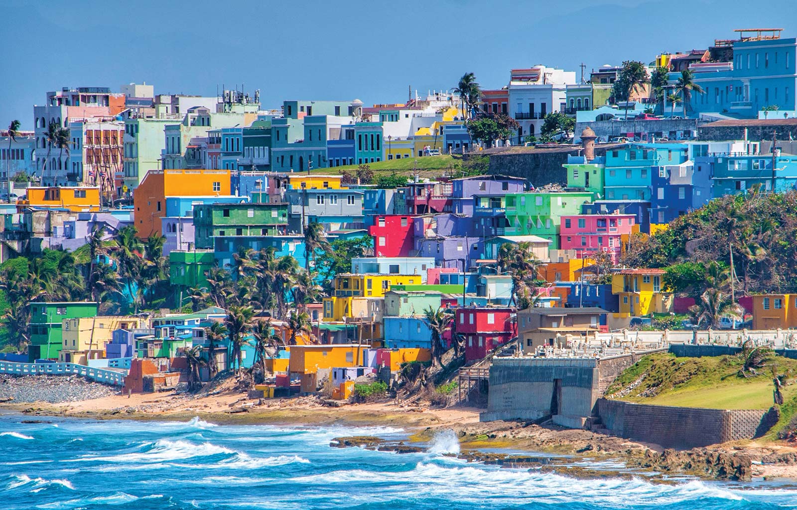 colorful houses on a hillside in San Juan Isla del Encanto which translates - photo 7