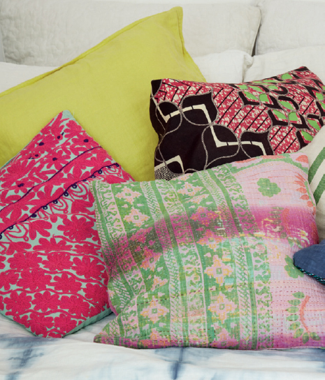 A vibrant mix of patterned pillows some handmade some store-bought livens up a - photo 17