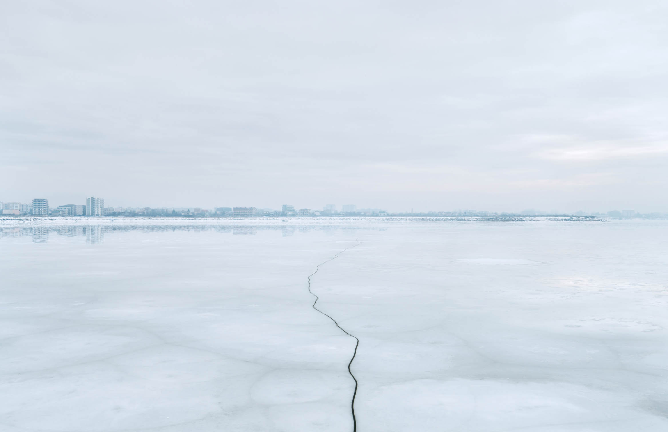 An ice fissure on Lacul Morii Mill Lake the largest lake in Bucharest - photo 2