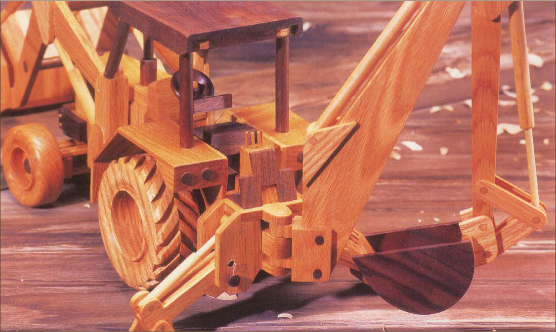 This backhoe uses a series of springs to give an impressively realistic - photo 11