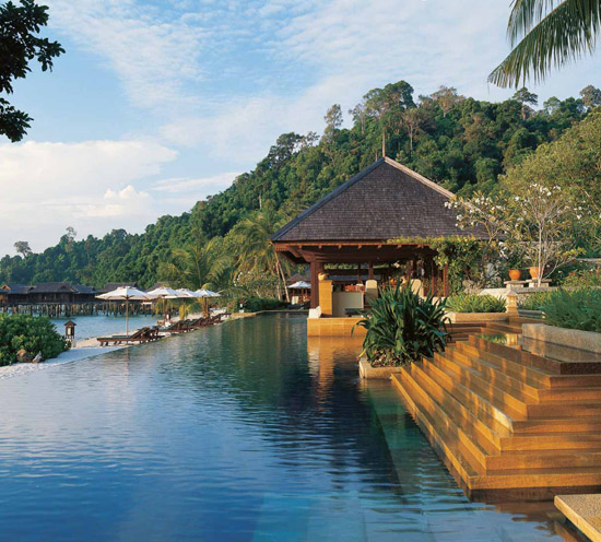 Serene pool and overwater residences at Spa Village at Pangkor Laut Resort - photo 7
