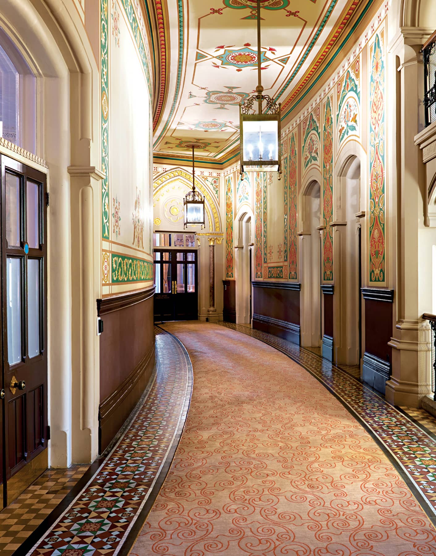 This highly decorated first-floor curved corridor has been restored to retain - photo 6