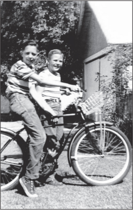 Don on bicycle with brother We journeyed on and eventually came upon a bridge - photo 3