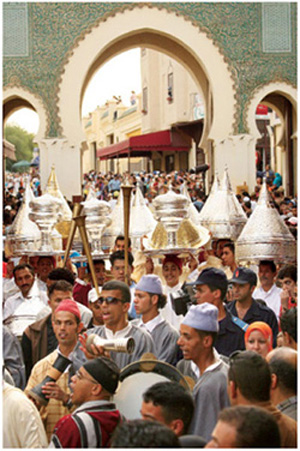 LEFT Offerings being taken to the saints shrine during the Festival of Moulay - photo 11