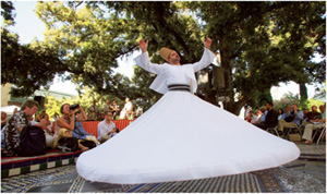 ABOVE A whirling dervish from Syria performs during the Fez Festival of World - photo 17