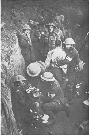 Wounded Canadians receiving medical treatment in the trenches Major Peter - photo 3