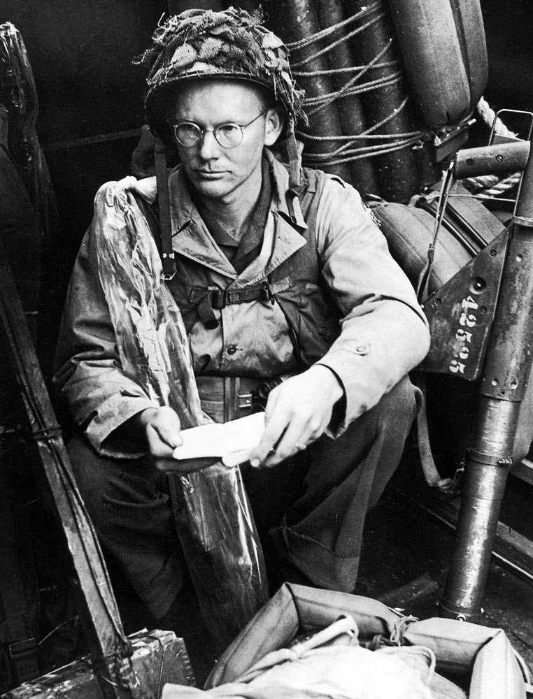 Cover photo A soldier waits on board ship 1st Infantry Division To his left - photo 1