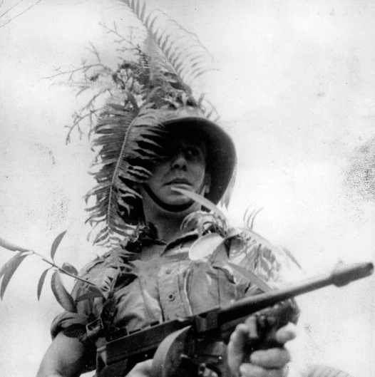 This Thompson sub-machine-gunner of the Manchester Regiment is on jungle - photo 2