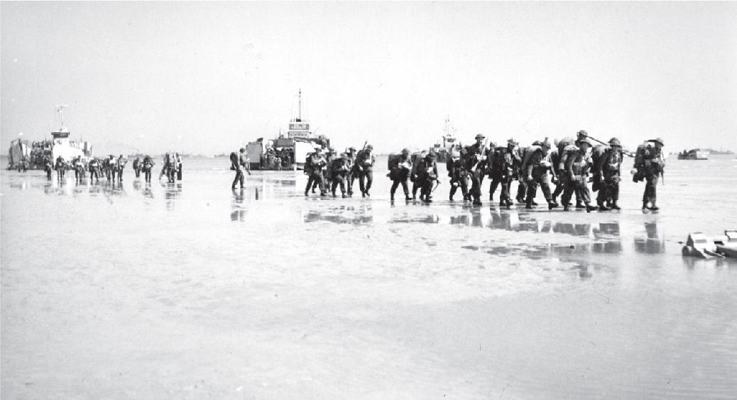 Canadians landing at Juno Beach US Army Rangers coming ashore at - photo 23