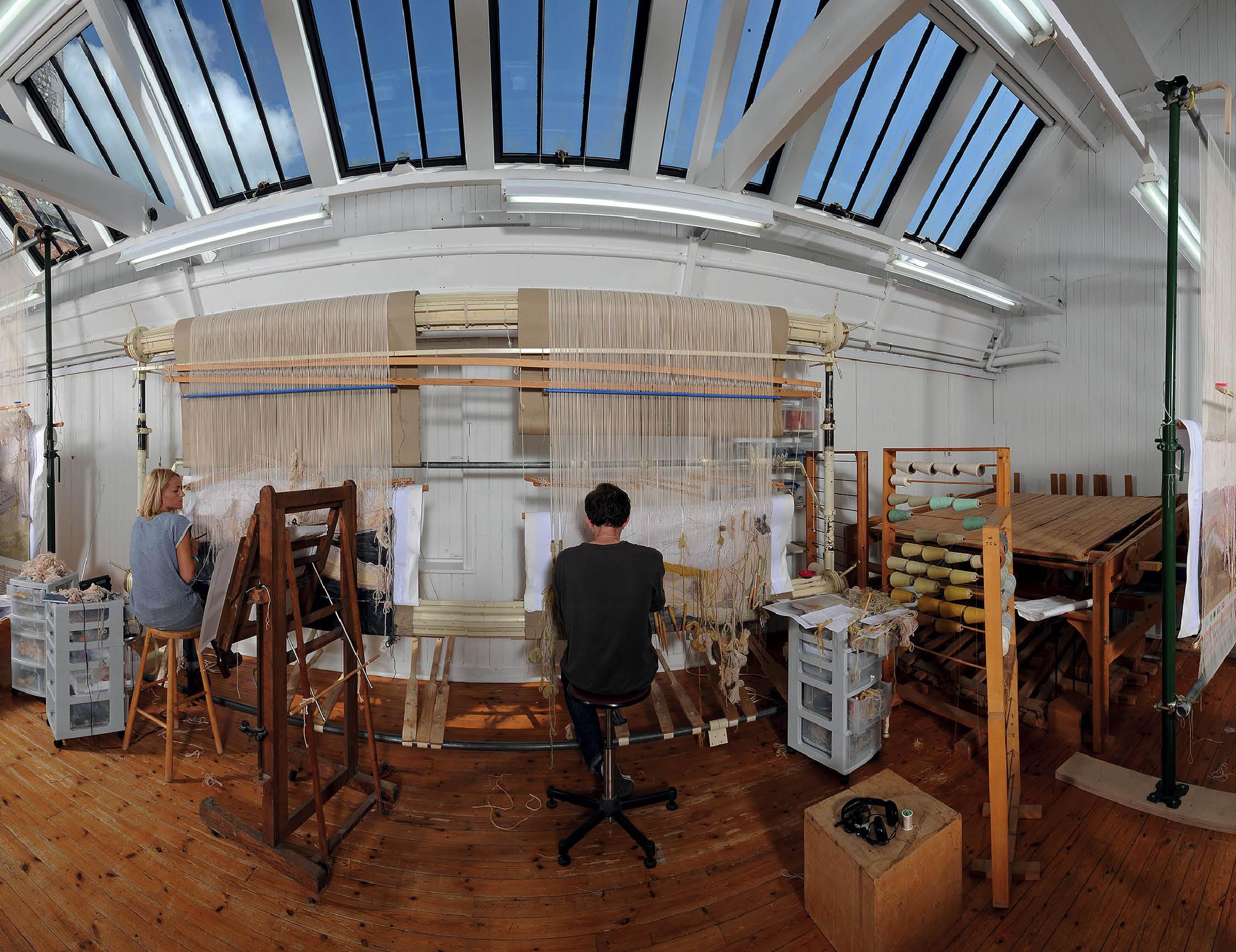 Weavers working on two haute-lisse or high-warp looms Note the fixed warp - photo 4