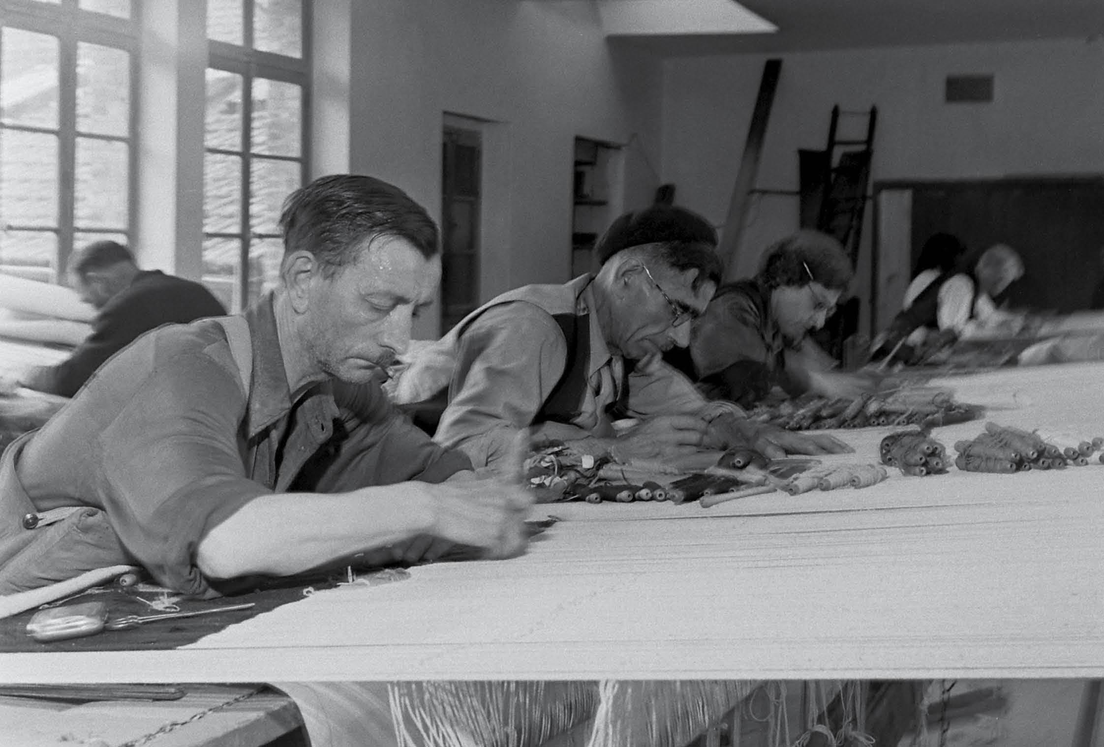 Tapestry weavers at Aubusson France in the late 1940s working on a - photo 5