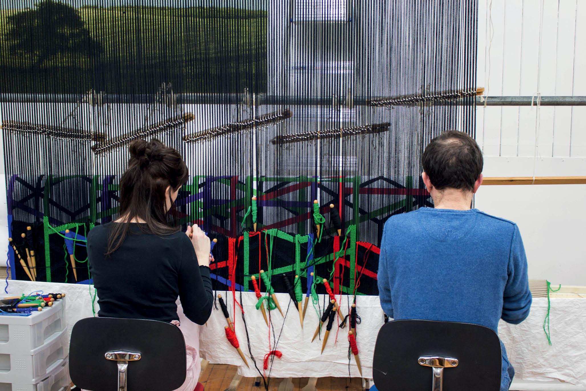 These weavers are working on a piece designed by Eva Rothschild Note the warp - photo 6