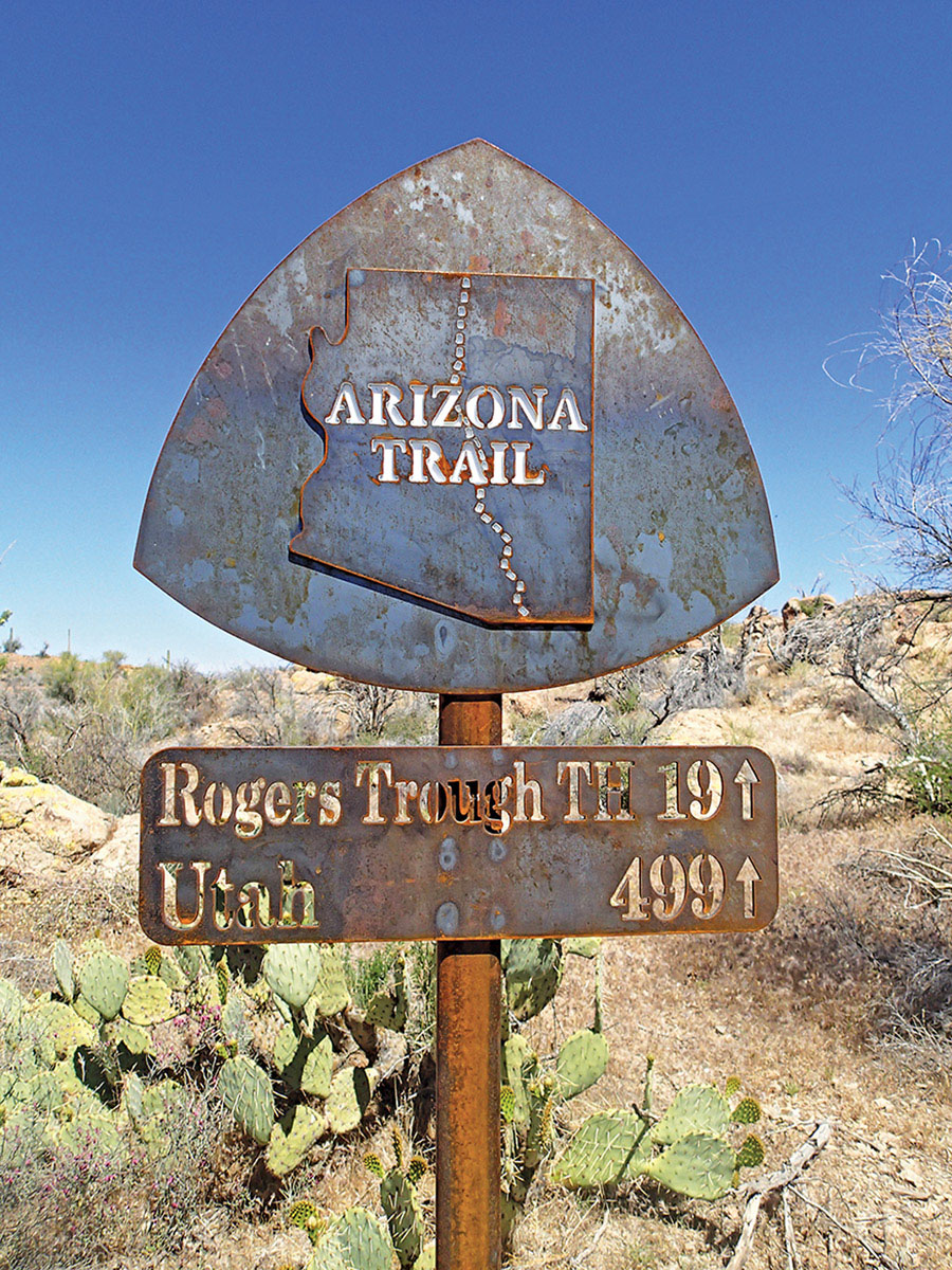 Metal signs on the Arizona National Scenic Trail AZT list mileages to Utah - photo 7