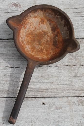 An antique lead melting pot The smelting process involves retrieving metal from - photo 3