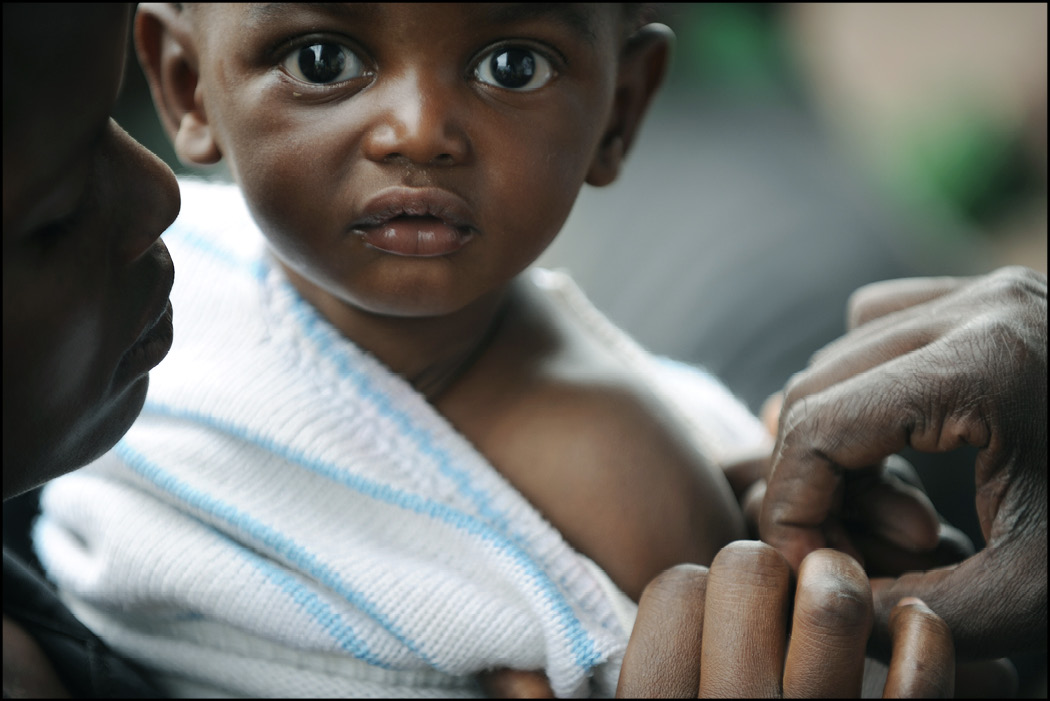 A child isnt too sure about being vaccinated against measles Credit Not - photo 4