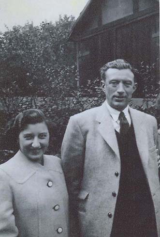 1 Hilda and George Clarke my mum and dad in front of the half-timbered - photo 3