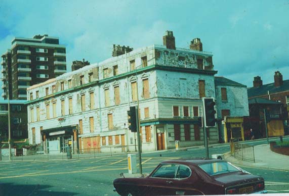 2 The building I grew up in its plywood windows indicating its imminent - photo 4