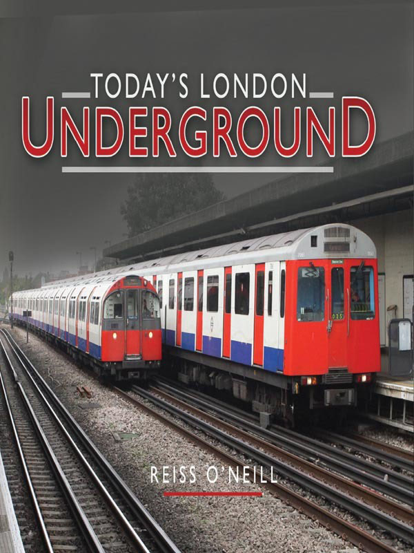 Front Cover With a train of 1973 Tube Stock about to rumble past on its - photo 1