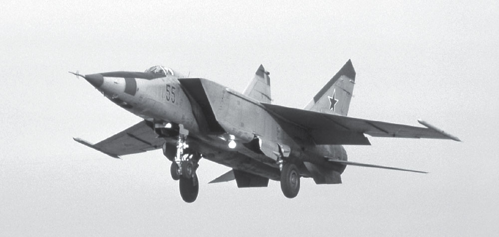 A fine study of MiG-25RBK 55 Red on final approach First published in - photo 2