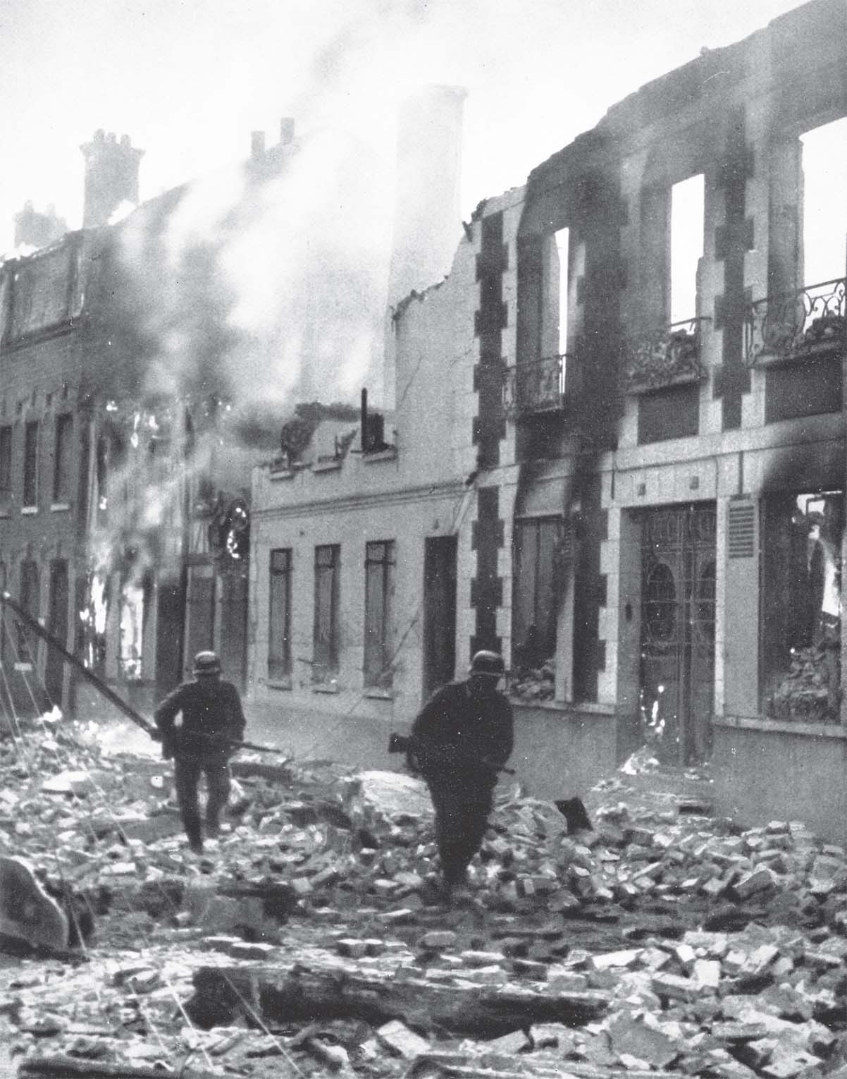 Assault troops in a battle damaged town Hitler in a conference with his - photo 16