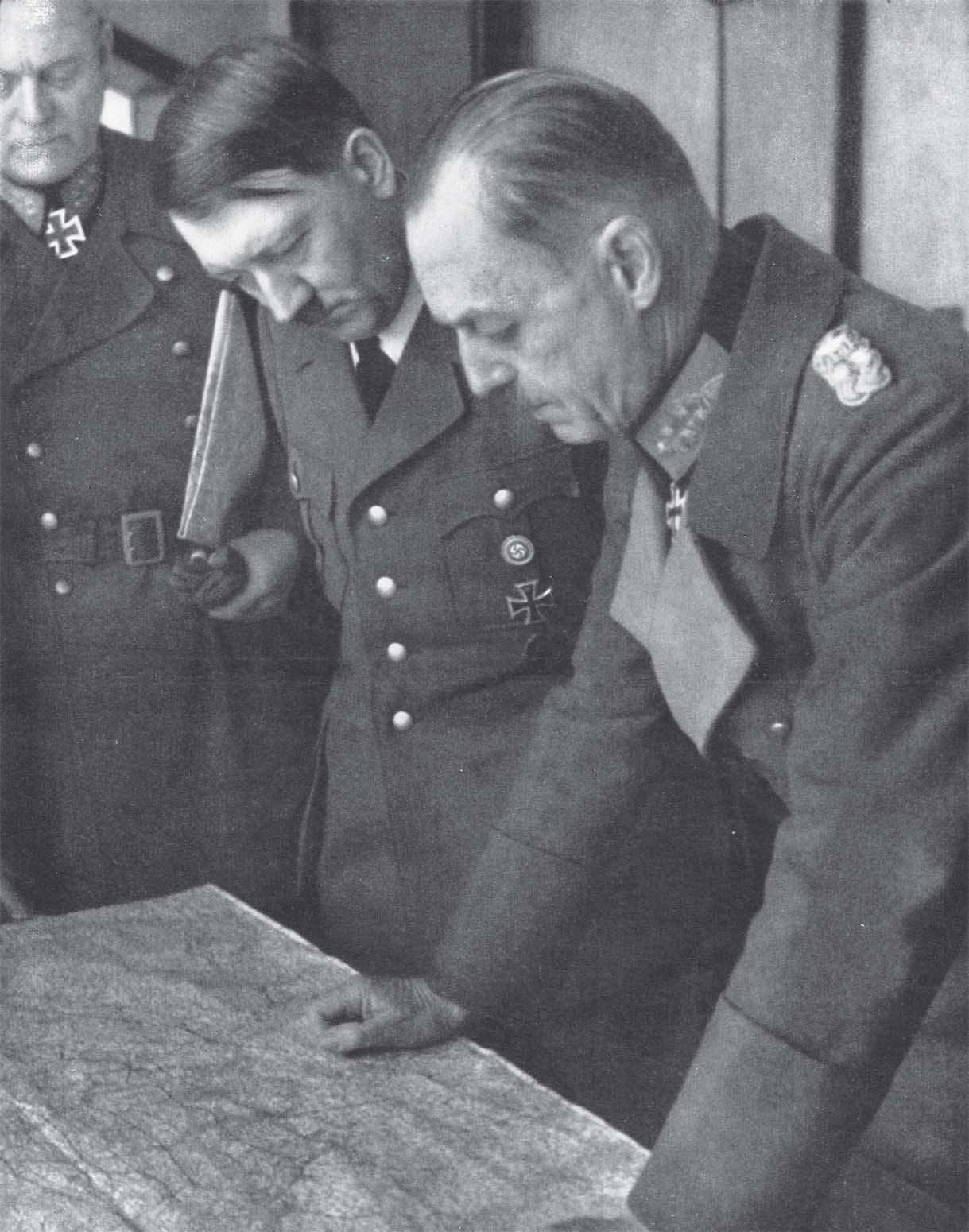 Generalfeldmarschall Karl Rudolf Gerd von Rundstedt delivers a report to the - photo 9