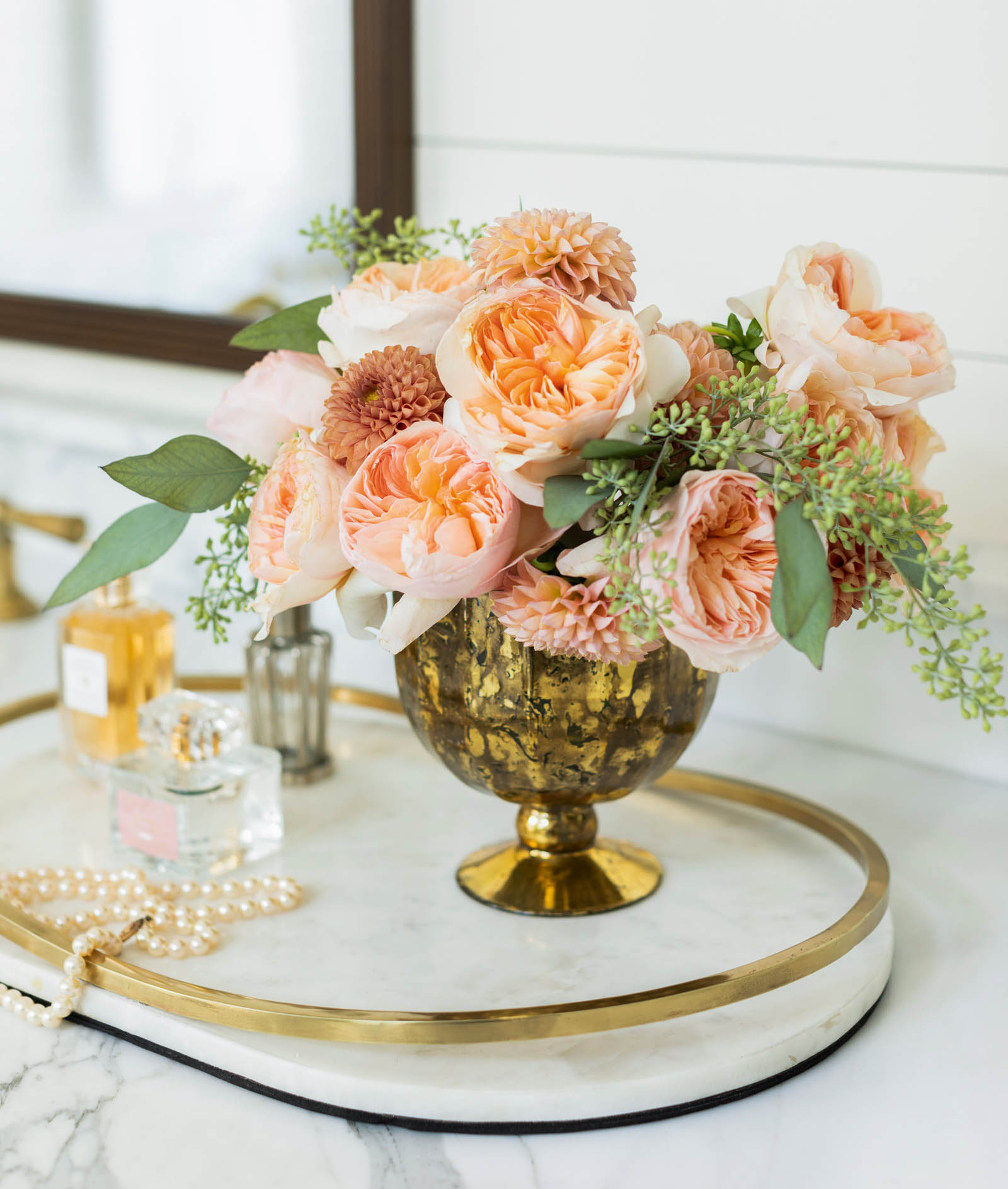 Flowers in shades of blush and rust complement the burnished tones ofan antique - photo 6