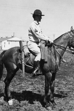 A technician 4th grade wearing khakis and M1931 lace-up cavalry boots mounted - photo 3