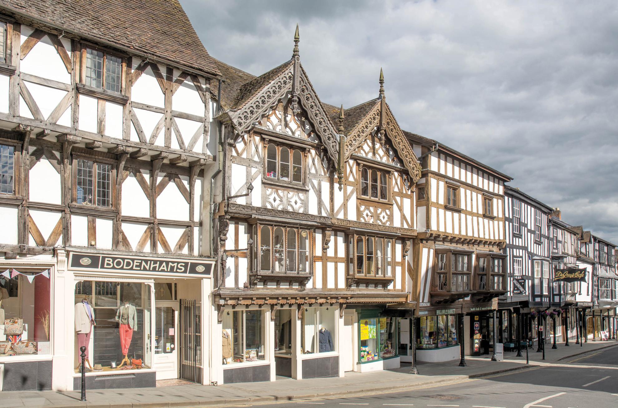 Broad Street in Ludlow has timber-framed buildings from the medieval period to - photo 4