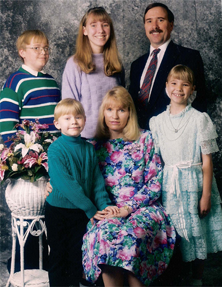 The photographer felt that adding a fake plant would make this portrait look - photo 10