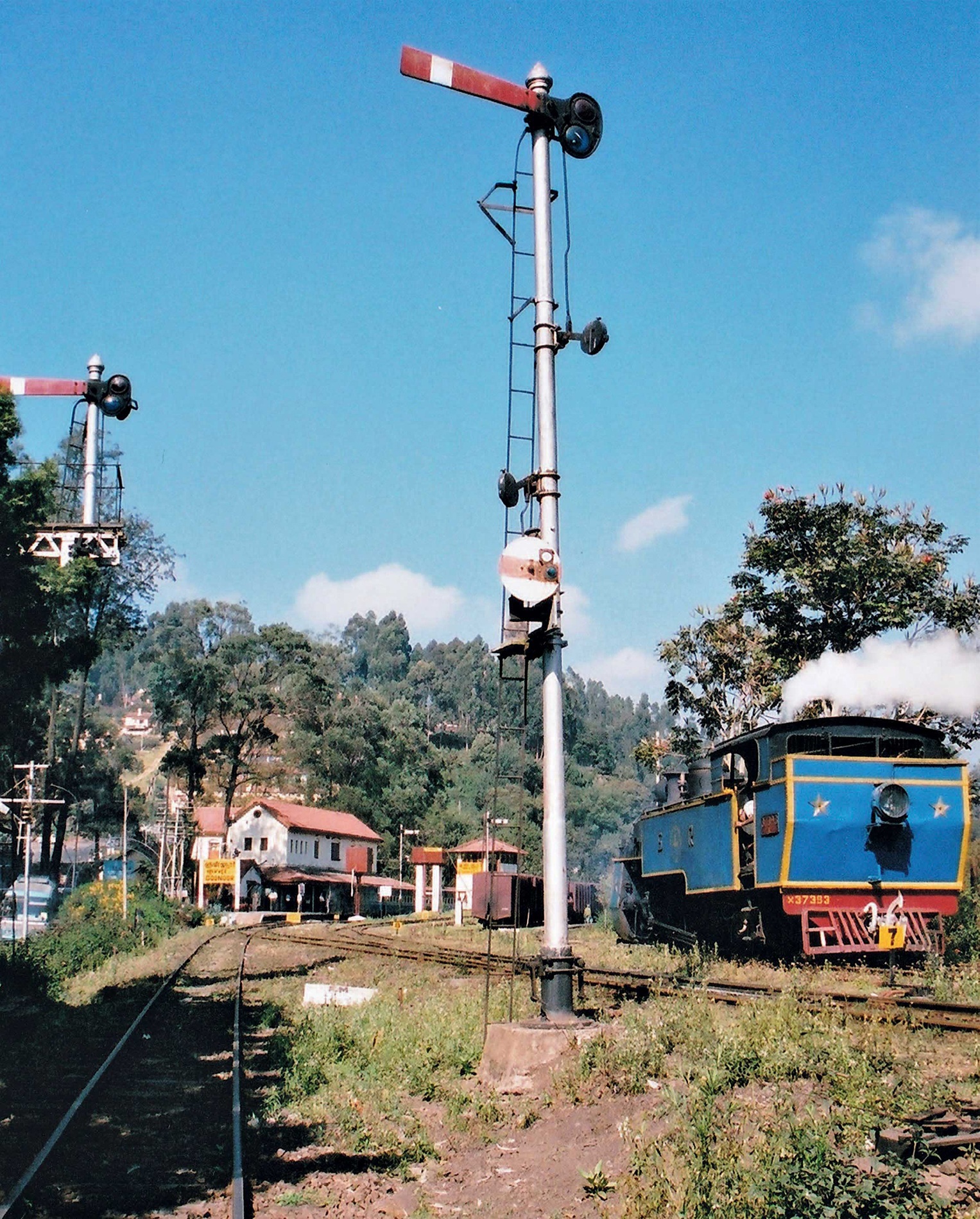 The pretty little station of Coonor on the Nilgiri Mountain Railway nestles in - photo 6