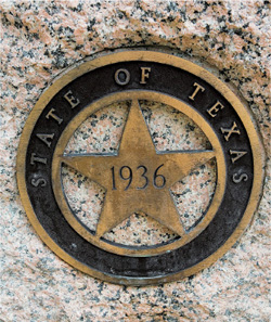 A bronze State of Texas marker graces a granite block outside the Blanco County - photo 9